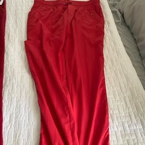 Red healing hands medium tall scrub bottoms.